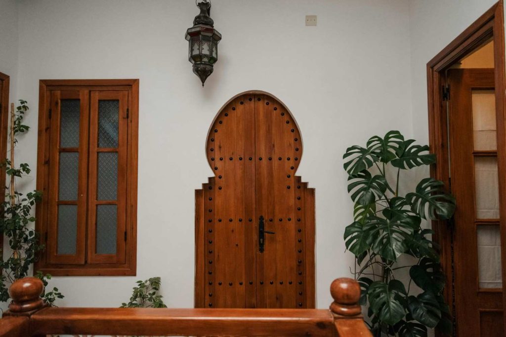 Traditional architectural details with focus on the carved door