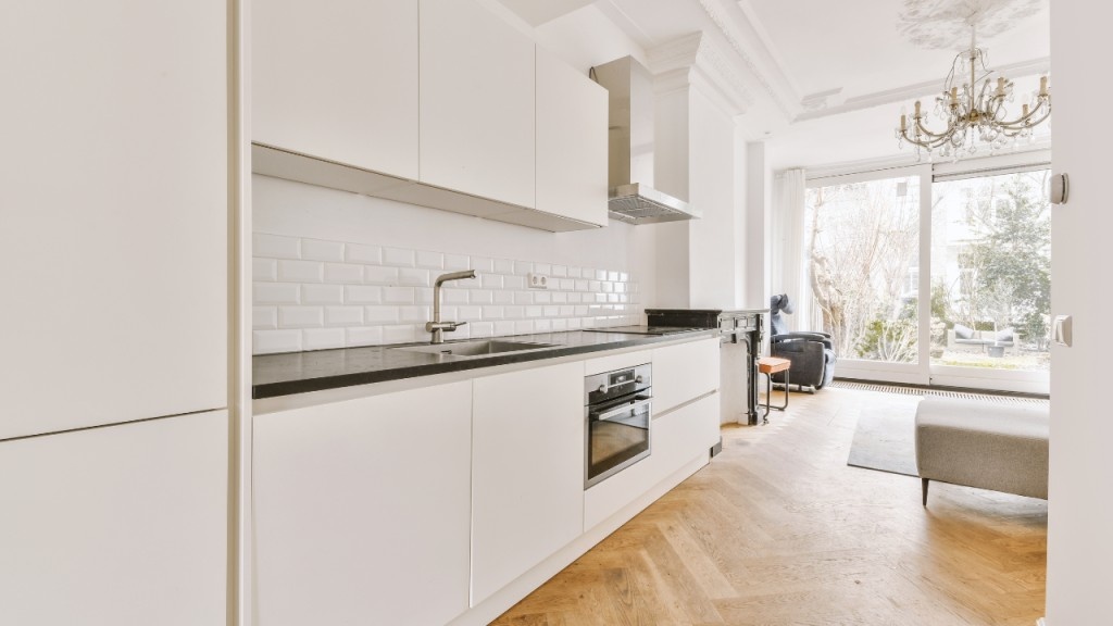 Contemporary kitchen with sleek cabinets and stainless steel appliances