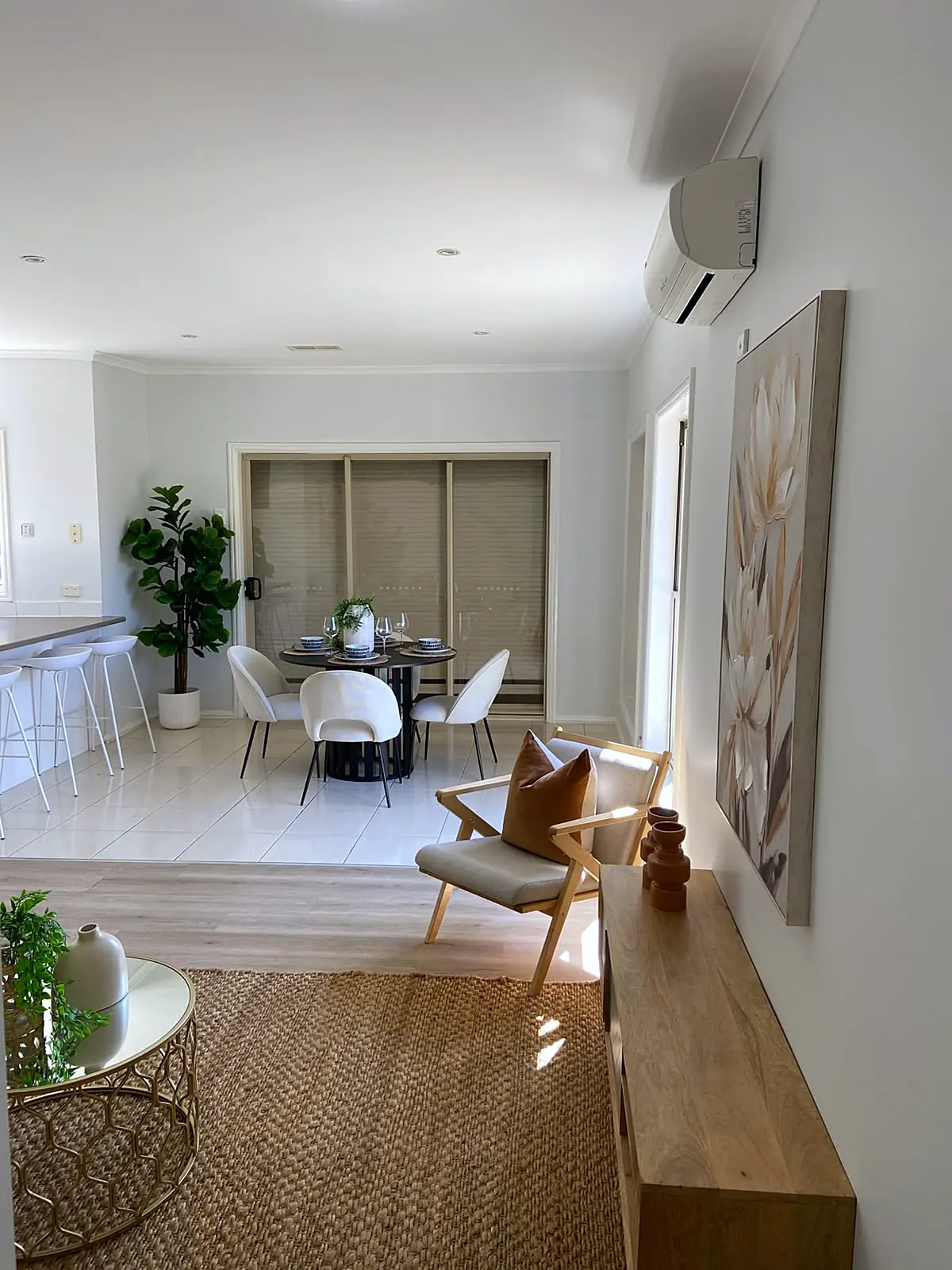 Open-plan living and dining room staged in a Braybrook home