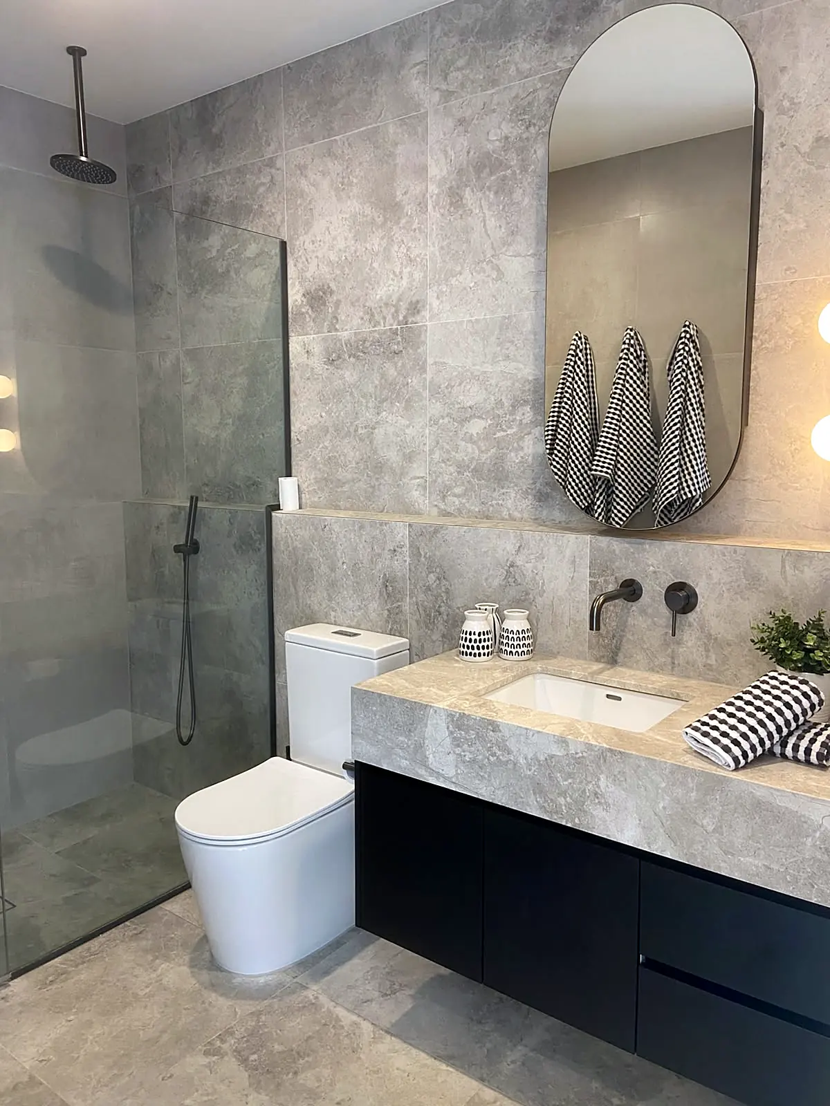 Marble bathroom styled with towels in a Bulleen home