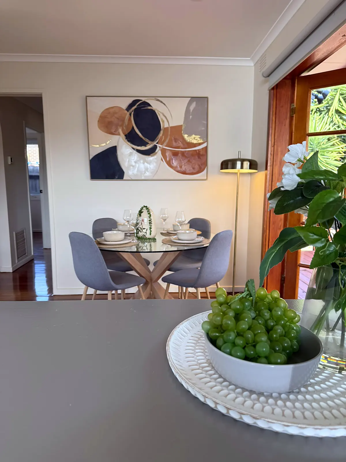Kitchen bench styling looking through to the dining area in a Frankston home