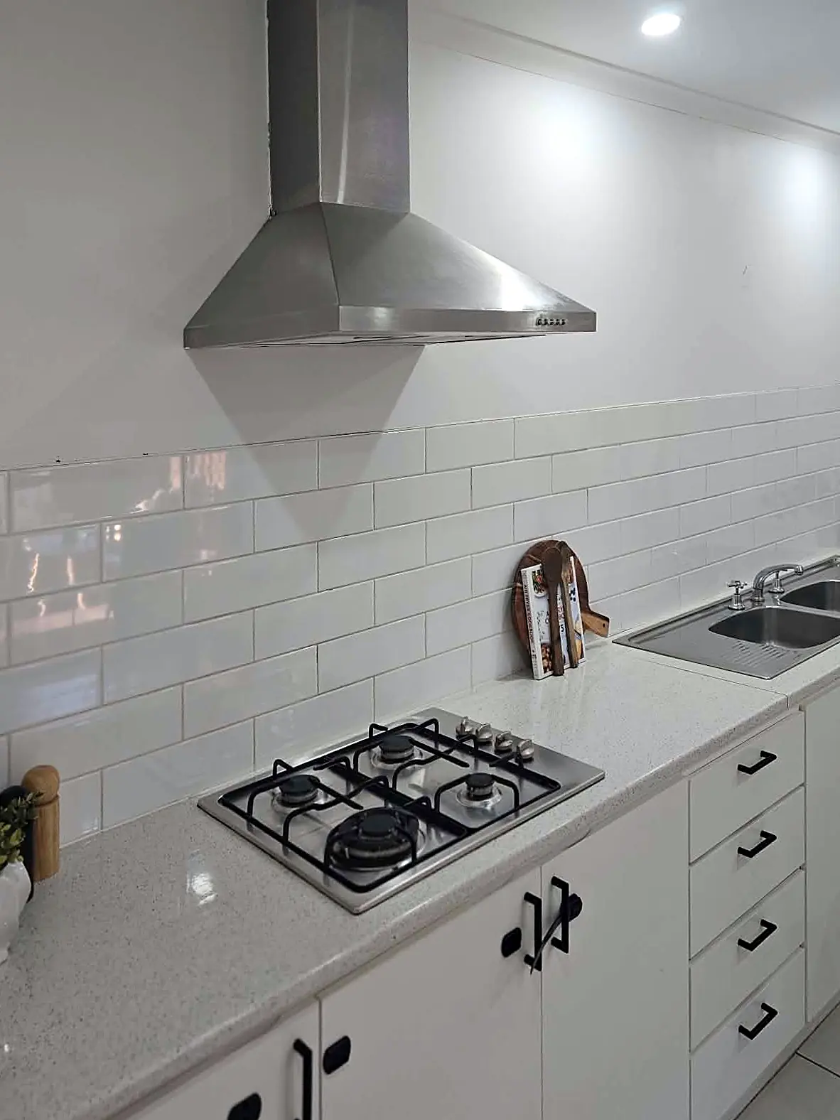 White kitchen with subway tiles styled for sale in a Hoppers Crossing home