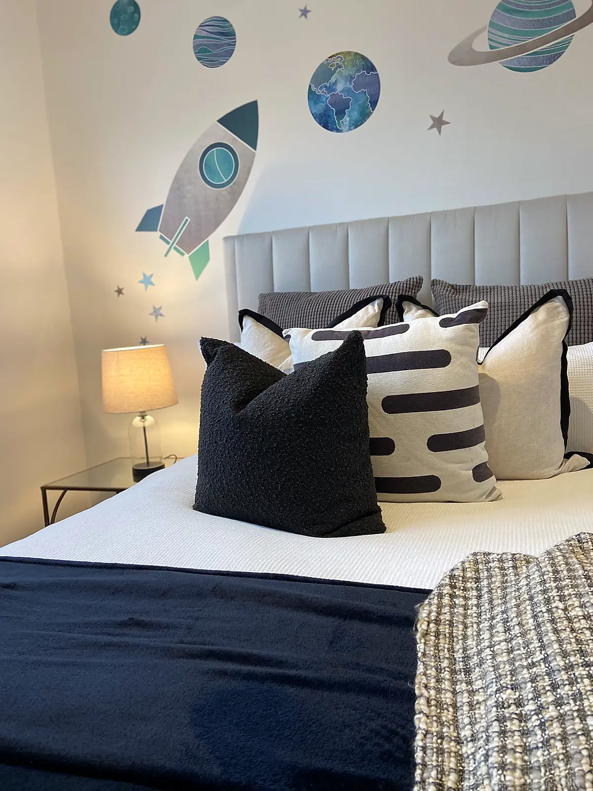 Child’s bedroom styled in navy and white in a Kew townhouse