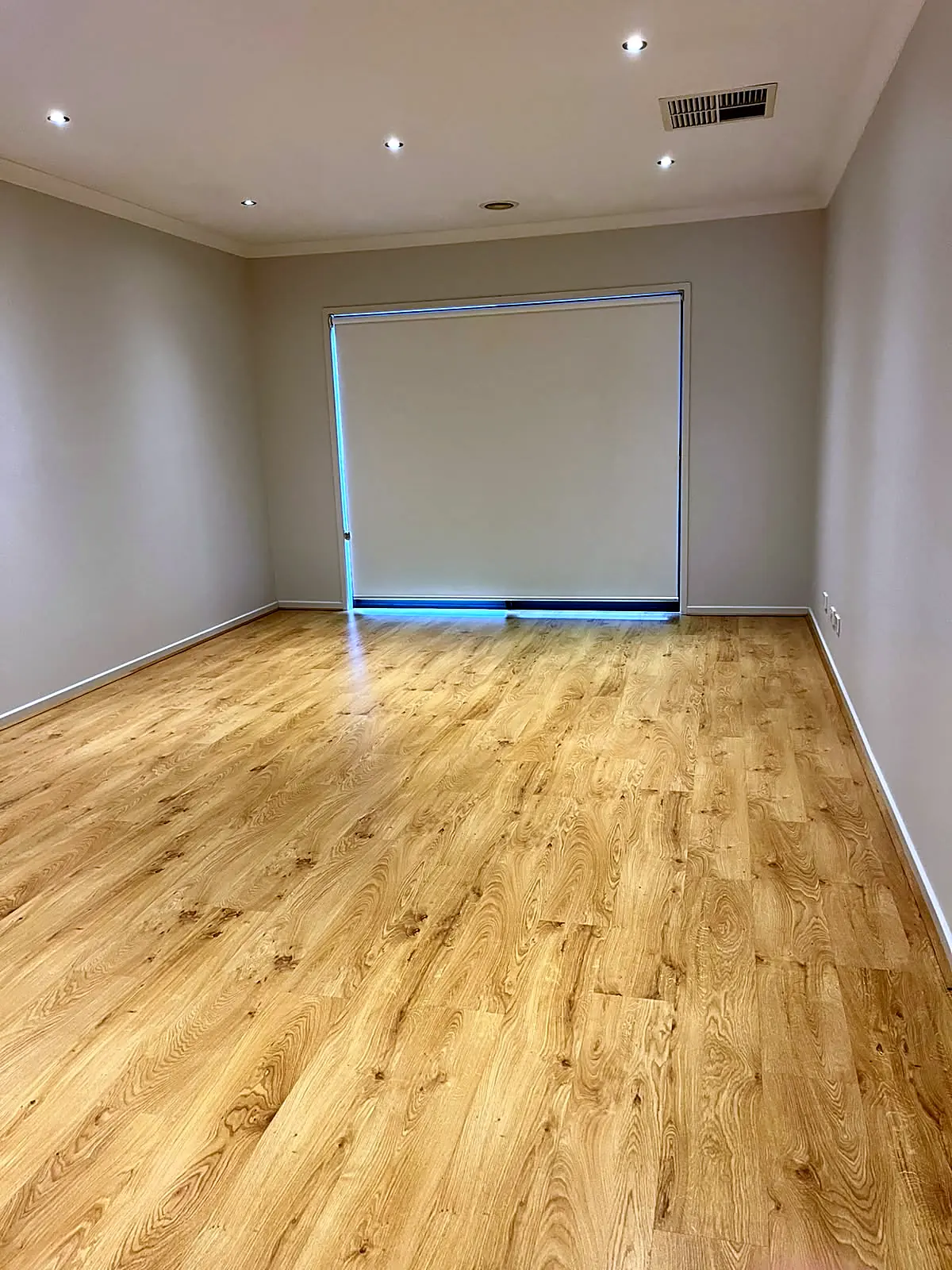 Empty front lounge before staging in a Mernda home