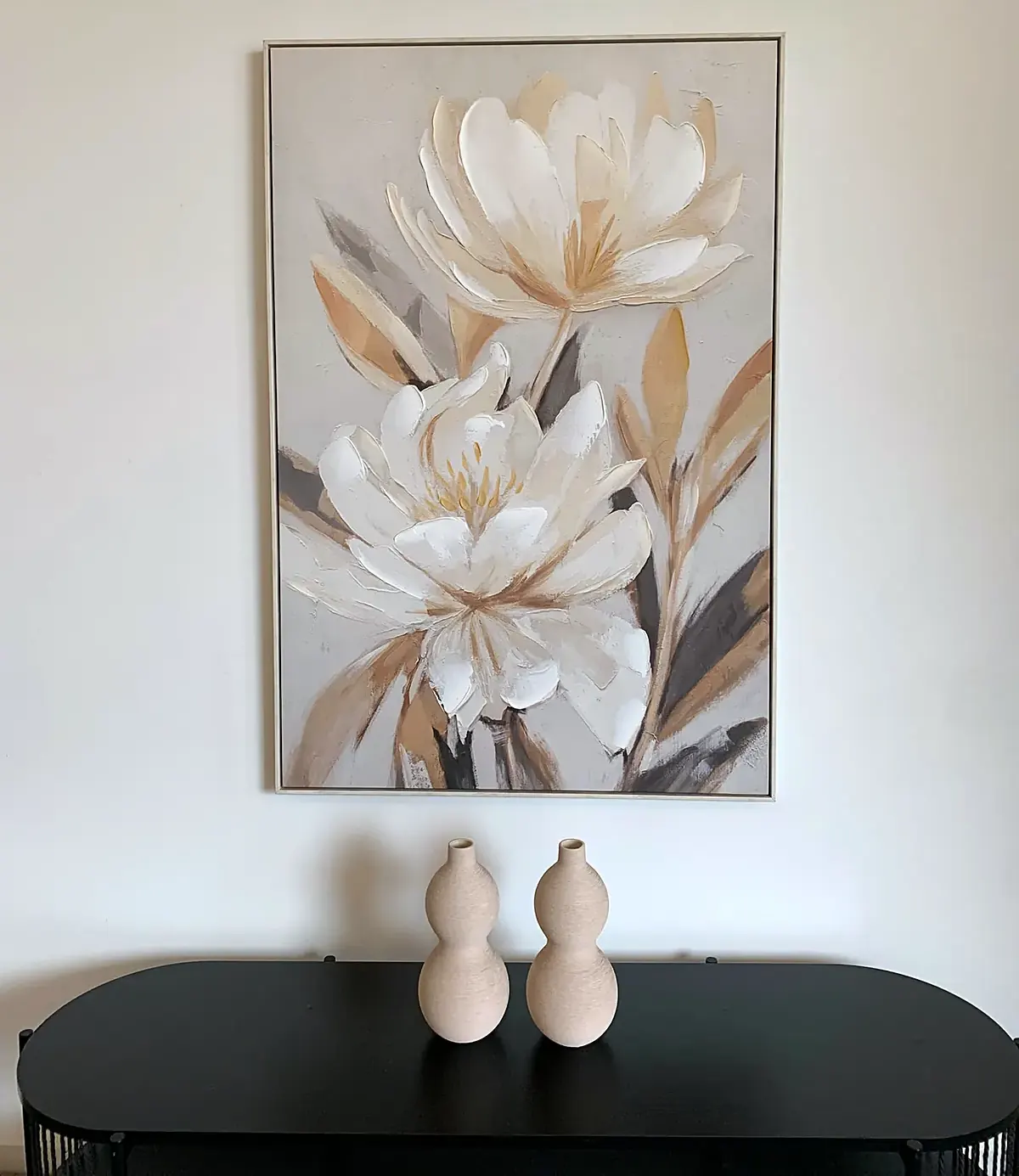 Console table and floral artwork styled in a Southbank apartment