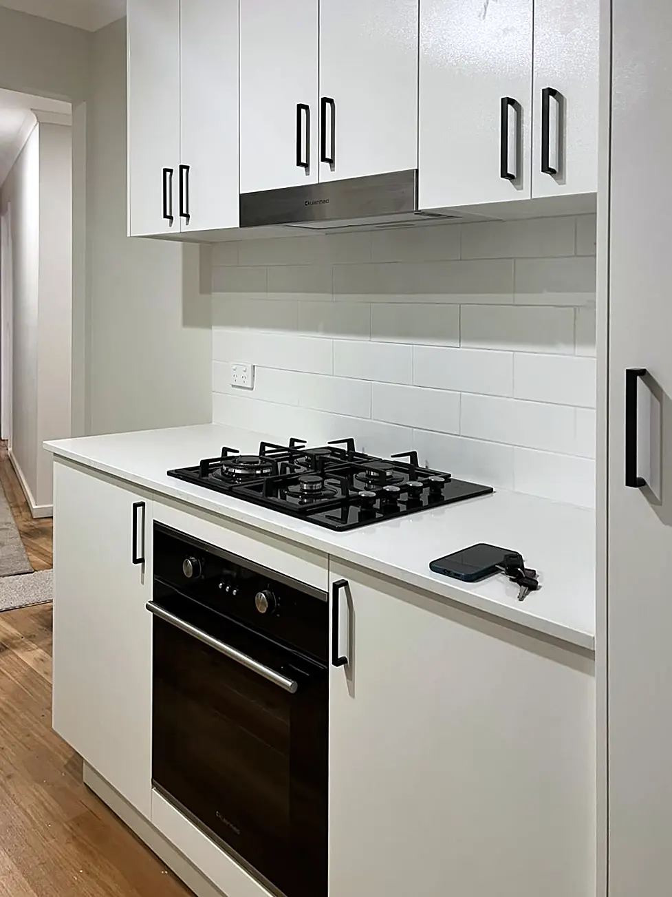 New white kitchen with black handles in a staged St Albans home