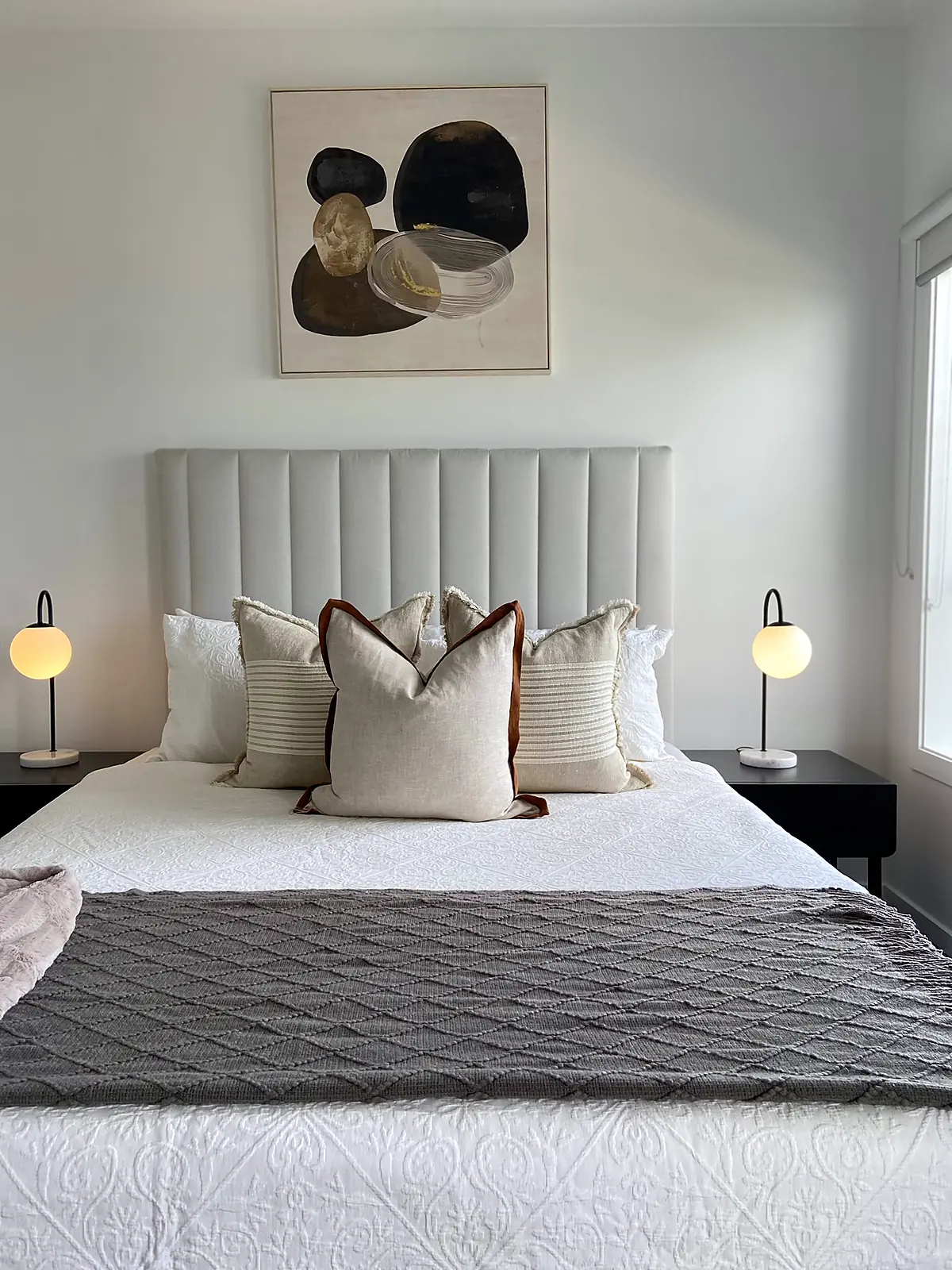 Master bedroom styled with upholstered bedhead in a Truganina home